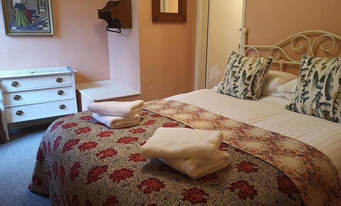Our rooms all have their own unique character, comfy beds with clean white linen and a traditional Welsh blanket laid over the top for extra warmth an
